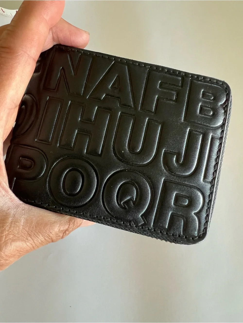 New Comme des Garcons Embossed Leather Zip Wallet